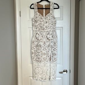 Dex Occasion white lace dress with tags. Size medium.